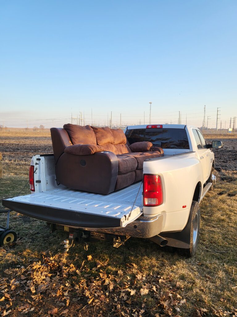couch removed and placed in the truck